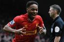 Liverpool's midfielder Raheem Sterling celebrates scoring at Anfield in Liverpool, northwest England, on February 8, 2014