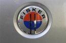The logo of an extended rage electric vehicle Fisker Karma is seen at the start of an electric car rally in Tallinn