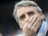 Manchester City's coach Mancini reacts ahead of their English Premier League soccer match against Newcastle United in Newcastle