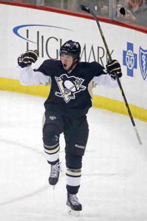 Pouliot scores in debut, Pens beat Panthers 3-1