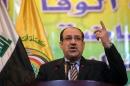 A file picture taken on January 11, 2014 shows Iraqi Prime Minister Nuri al-Maliki speaking during a political meeting in Baghdad