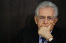 Italian caretaker Prime Minister Monti attends an end of year news conference in Rome