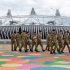 Members of the armed forces walk through the Olympic Park in east London
