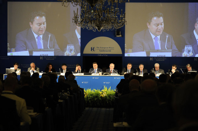 Deputy Prime Minister of Turkey Ali Babacan, center, speaks during a meeting on the world economy in Cernobbio, Italy, Friday, Sept. 7, 2012. Experts and leaders gathered in Italy to discuss the global financial crisis. (AP Photo/Giuseppe Aresu)
