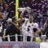 Ravens' quarterback Flacco hoists Lombardi Trophy following victory in Super Bowl XLVII in New Orleans