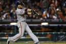 San Francisco Giants' Marco Scutaro hits an RBI single against the Detroit Tigers in the tenth inning during Game 4 of the MLB World Series baseball championship in Detroit