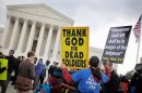 Westboro Baptist Church protesters are seen outside the U.S. Supreme Court in Washington.