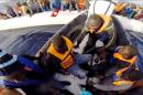 This video grab released by the Italian Coast Guard on April 22, 2015 shows personnel taking part in an operation to rescue shipwrecked migrants on April 20, off the coast of Sicily