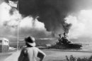FILE - In this Dec. 7, 1941 file photo, American ships burn during the Japanese attack on Pearl Harbor, Hawaii. (AP Photo)