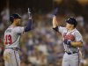 Atlanta Braves' Kris Medlen, right, his congratulated by Andrelton Simmons after hitting a solo home run during the fifth inning of a baseball game against the Los Angeles Dodgers, Saturday, June 8, 2013, in Los Angeles.  (AP Photo/Mark J. Terrill)