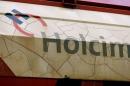 The logo of Swiss cement maker Holcim is seen on a railway-car in the town of Schlieren