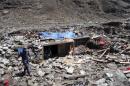 Soldiers search for bodies after a massive avalanche triggered by last week's earthquake overwhelmed Langtang village, Nepal