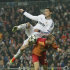 Real Madrid's Cristiano Ronaldo from Portugal, top left, is challenged by Galatasaray's Semih Kaya, right, during the Champions League quarterfinal first leg soccer match between Real Madrid and Galatasaray at the Santiago Bernabeu stadium in Madrid, Wednesday, April 3, 2013. (AP Photo/Andres Kudacki)