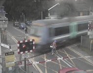 A cyclist came within inches of being hit by a train after dodging a level-crossing barrier at the Waterbeach crossing in Cambridgeshire (British Transport Police/PA)