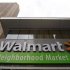 A Walmart Neighborhood Market sign is seen outside a newly opened store in Chicago
