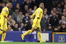 Crystal Palace's Jason Puncheon, right, celebrates scoring their first goal of the game against Everton during their English Premier League match at Goodison Park, Liverpool, England Wednesday April 16, 2014. (AP Photo/Barry Coombs/PA) UNITED KINGDOM OUT