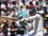 Australia's Phil Hughes plays a shot during the second day's play of the third cricket test match against Sri Lanka at the Sydney Cricket Ground