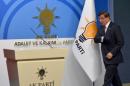 Turkey's Prime Minister Davutoglu arrives for a news conference at his ruling AK Party headquarters in Ankara, Turkey