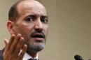 Syrian opposition leader Jarba answers questions during a news conference in Geneva