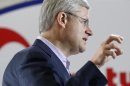 Canadian PM Harper speaks during a news conference in Whitehorse