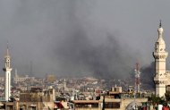 Un panache de fumée s'élève au dessus de Damas, après l'attentat qui a tué quatre hauts responsables syriens, mercredi 18 juillet, AP/SIPA