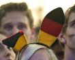A Fan Wears Fake Bunny Ears Displaying The German National Flag's Colours On June 13, 2012 Near The Brandenburg Gate In AFP/Getty Images