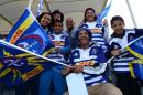 Stormers fans cheer during the Super 15 Rugby Union match in Christchurch on March 8, 2014