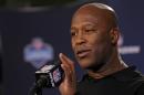 Tampa Bay Buccaneers head coach Lovie Smith answers a question during a news conference at the NFL football scouting combine in Indianapolis, Thursday, Feb. 20, 2014. (AP Photo/Michael Conroy)