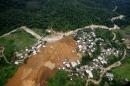 Aerial view of the landslide that buried part of La Pintada village, Guerrero state, Mexico, after heavy rains hit the area, on September 19, 2013
