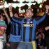 Soccer fans react as they watch the Euro 2012 semi-final soccer match between Germany and Italy at the fan zone in Kiev