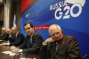 Finance ministers from Germany, Britain, Russia, France and OECD secretary-general attend a news conference, part of the G20 finance ministers and central bank governors' meeting, in Moscow