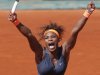 Serena Williams of the U.S. celebrates winning against Russia's Svetlana Kuznetsova in three sets 6-1, 3-6, 6-3, in their quarterfinal match at the French Open tennis tournament, at Roland Garros stadium in Paris, Tuesday June 4, 2013. (AP Photo/Christophe Ena)