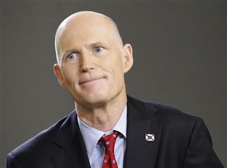 Florida Governor Rick Scott speaks during an interview in New York, March 26, 2012. REUTERS/Brendan McDermid