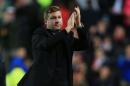 Milton Keynes manager Karl Robinson thanks the fans after their League Cup Second Round match against Manchester United at Stadium:mk, Milton Keynes, England, Tuesday Aug. 26, 2014. MK Dons defeated Manchester United 4-0. (AP Photo/PA, Nick Potts) UNITED KINGDOM OUT NO SALES NO ARCHIVE