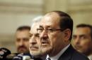 Iraqi Vice President Nuri al-Maliki speaks during a news conference in Baghdad