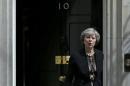 Britain's Home Secretary, Theresa May, leaves after attending a cabinet meeting at Number 10 Downing Street in London