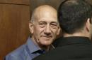 Former Israeli Prime Minister Ehud Olmert waits to hear his verdict at the Tel Aviv District Court