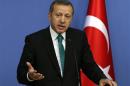 Turkey's Prime Minister Tayyip Erdogan addresses the media in Ankara