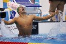 South Africa's Chad le Clos celebrates winning the men's 200m butterfly final during the London 2012 Olympic Games at the Aquatics Centre