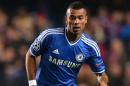 Chelsea's defender Ashley Cole runs with the ball at Stamford Bridge on December 11, 2013