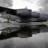 A U.S. airforce Globemaster3 C-17A is manoeuvred onto its stand ahead of the Farnborough Airshow 2012 in southern England
