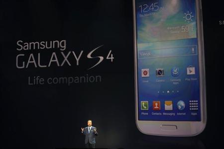 Shin, President and head of IT and Mobile Communication Division, introduces Samsung Electronics Co's latest Galaxy S4 phone during its launch in New York