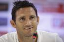 England national soccer team player Frank Lampard answers a question from a journalist during a press conference after a squad training session that was closed to the media for the 2014 soccer World Cup at the Urca military base in Rio de Janeiro, Brazil, Tuesday, June 17, 2014. (AP Photo/Matt Dunham)