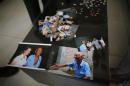 Pictures of Liu's father, who was a forced labourer by Mitsui Mining to work in their mines in Fukuoka of Japan, are seen on a table during an interview with Reuters on the outskirts of Beijing