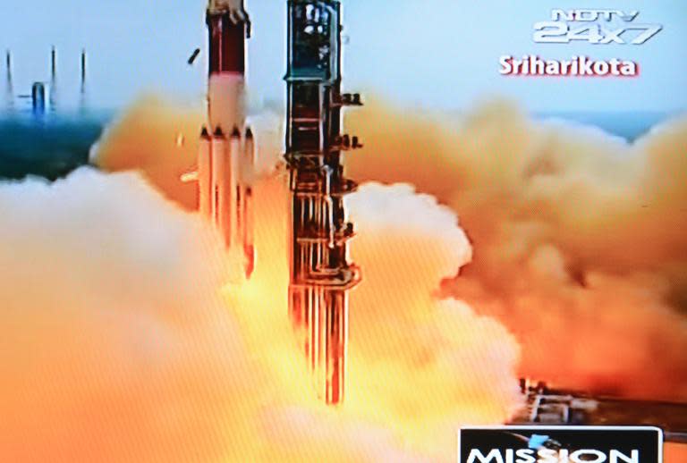 A frame grab from Indian television channel NDTV, broadcasting footage from state television Doordarshan, shows the PSLV-C25 launch vehicle lifting off from the launch pad in Sriharikota on November 5, 2013