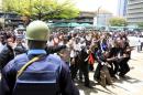 Kenyan university students demonstrate outside Police Headquarters following killings of students at Garissa University College campus in capital Nairobi
