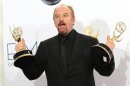 Louis C.K. holds the Emmy awards for outstanding writing for a variety special for "Louis C.K. Live at the beacon Theatre" and outstanding writing in a comedy series for his show "Louie" at the 64th Primetime Emmy Awards in Los Angeles