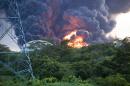 View of the explosion of a second fuel storage tank at the Puma Energy plant in Puerto Sandino, 70 km northwest of Managua, on August 18, 2016