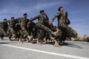 Afghan National Army soldiers march during the graduation ceremony which marks the completion of nine weeks of training at the Kabul Military Training Center in Kabul