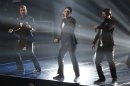 Bass, Chasez and Timberlake of NSYNC perform during the 2013 MTV Video Music Awards in New York